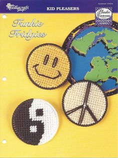 three crocheted patches with smiley faces on them