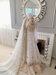 a dress on display in front of a mirror