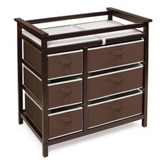 a baby crib with drawers and changing table