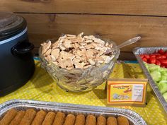 an assortment of food is displayed on a table