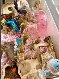 an assortment of toys and plants in a box