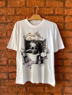 Vintage 90s Marilyn Monroe Photoprint Swag Kids / Photography Art Fashion T Shirt / Pop Culture Fashion / Vintage Streetwear T Shirt Size MCondition : Good Used Size on tag : MColour : WhiteBrand : UnknownMeasurement : Armpit to armpit -20”Length - 26”Material : Old CottonMade In: JapanTHE SHIPPING (Your Choice Please read)1. The shipping cost is USD 20 via Malaysian Registered Postage With Tracking Number.It will take 2-4 weeks or more for delivery, depends on your custom checking.2. Add USD 10 Swag Kids, Pop Culture Fashion, Kid Swag, Culture Fashion, Streetwear T Shirt, Japanese Streetwear, Fashion T Shirt, Streetwear Tshirt, Movie T Shirts