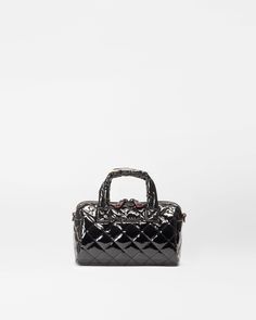 Our Mini Metro Satchel is a quilted crossbody bag that features a zip top closure and leather padded top handles. This quilted mini bag has a detachable strap that adjusts for maximum comfort. Formal Quilted Top Handle Bag, Formal Quilted Double Handle Bags, Black Quilted Bag For Formal Occasions, Luxury Quilted Top Handle Satchel, Formal Black Quilted Bag, Black Quilted Evening Bag, Black Quilted Top Handle Bag, Black Quilted Top Handle Shoulder Bag, Quilted Satchel Evening Bag