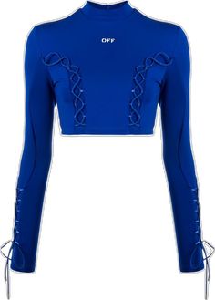 Blue Cropped Elastane Top, Sporty Long Sleeve Elastane Crop Top, Blue Crop Top For Fall, Blue Cropped Elastane Crop Top, Blue Fitted Elastane Crop Top, Fitted Blue Elastane Crop Top, Blue Long Sleeve Crop Top For Night Out, Blue Fitted Stretchy Crop Top, Blue Fitted Long Sleeve Crop Top