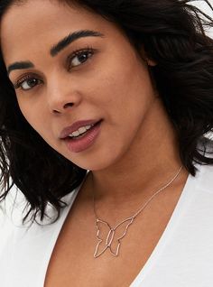 A butterfly-shaped charm shimmers on a silver chain to give this delicate necklace an eye-catching look. Lobster clasp. 19” length and 5” extender. Man-made materials. Imported. The best plus size women's silver-tone butterfly wire necklace necklaces in silver. Torrid is your destination for the freshest spring and summer styles. Sterling Silver Butterfly Necklace With Clavicle Chain, Adjustable Delicate Chain Butterfly Necklace, Adjustable Butterfly Necklace With Delicate Chain, Butterfly Shaped Necklace With Delicate Chain, Delicate Chain Butterfly Necklace, Delicate Butterfly Necklace With Chain, Wire Necklace, Summer Styles, Delicate Necklace