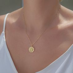 Sunflower pendant necklace. Layer it or wear it on its own. Crafted on sturdy non tarnish 14K gold filled box chain. Pendant details: * Finish: non tarnish 24K gold filled * Size: 24 mm x 18 mm Comes in our gift ready packaging: soft velvet pouch for safe jewelry storing and branded box Packaged and shipped with care from our studio located in sunny Tampa, FL Flower Girl Necklace, Sunflower Gifts, Unique Gifts For Mom, Sunflower Pendant, Sunflower Necklace, Tarnished Jewelry, Daisy Necklace, Jewelry Words, Christmas Gift For Her