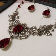 Red garnet gothic necklace deep red jewel choker victorian | Etsy Summer Court, Jewel Choker, Fantasy Jewellery, Baroque Necklace, Bridal Statement Necklace, Beautiful Pendants, Victorian Necklace, Necklace Gothic, Red Jewel