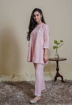 PRODUCT DETAIL: A must have modern pink cotton co-ord set comes with embroidered floral motif, enhanced with lace on sleeves and Pants. SPECIFICATIONS: Color Pink Fabric Cotton Product Code PCS26 Pink Cotton Loungewear Sets, Spring Cotton Sets For Daywear, Spring Cotton Daywear Sets, Cotton Sets For Daywear In Spring, Elegant Pink Loungewear Set, Elegant Pink Long Pants Set, Elegant Pink Sets With Long Pants, Long Sleeve Sets For Eid, Long Sleeve Matching Set For Eid