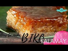 a piece of cake on a plate with the words how to make bkk kalamay