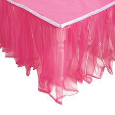 a pink tablecloth with white trim on it