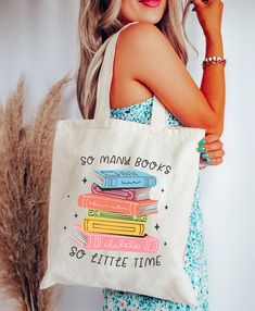 "So Many Books So Little Time Tote Bag, Canvas Tote Bag, Book Bag, Library Bag, Library Book Bag, Books Tote Bag, Bookish Tote Bag, Book Lover Gift BAG DIMENSIONS: Height: 15.75\" Width: 15.25\" Handle length: 21.5\" FABRIC: - 100% cotton sheeting - Reinforced handle CARE INSTRUCTIONS: Wash inside out with cold water. Air dry or tumble on low. PROCESSING AND SHIPPING: Processing time is 1-4 business days Shipping: average is 3-5 business days, depending on destination. Please see the shipping estimate based on your location. ALL SALES ARE FINAL: We are a print-on-demand shop which means that items are made special for you when you place the order, therefore we cannot accept returns or exchanges. Please read the description carefully before ordering. Please message me with any questions :) Bookish Rectangular Canvas Bag, Rectangular Canvas Bag With Bookish Style, Bookish School Bags With Letter Print, White Bookish Bag For Daily Use, White Bookish Bags For Daily Use, White Bookish Bag For Everyday Use, Books Tote Bag, Library Book Bag, Handpainted Tote Bags