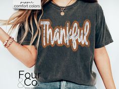 The perfect shirt for turkey day! This Comfort Colors tee comes in all the great Fall colors! Size up for oversized fit. Refer to size chart for measurement specifics. SIZING: *Unisex sizing *See size chart image for measurements DESCRIPTION: *SWEATSHIRTS: Unisex heavy blend crewneck sweatshirt Loose fit Runs true to size 50/50 cotton/polyester Sewn-in label No side seems *BELLA + CANVAS TEES: Unisex short sleeve tee 100% Airlume combed and ringspun cotton (fiber content may vary for different colors) Light fabric Tear away label Runs true to size *COMFORT COLORS TEES: Unisex short sleeve tee Medium fabric Relaxed fit Sewn-in twill label 100% ring-spun cotton No side seems *KIDS GILDAN TEES Unisex heavy cotton tee Tear away label  Shoulders have twill tape for improved durability No side s Matching Thanksgiving Shirts, Thankful Shirt, Turkey Day, Thanksgiving Shirt, Bella Canvas Tees, Thanksgiving Shirts, Comfort Colors Tee, Unisex Shorts, Perfect Shirt