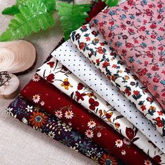 a pile of fabric sitting on top of a table next to some vegetables and mushrooms