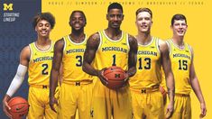 the michigan basketball team is posing for a photo