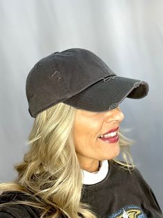 This vintage distressed ball cap will be your perfect grab-and-go accessory all summer long! Featuring lightweight cotton and an adjustable strap at the back for a perfect fit, this cap ticks all the boxes for a classic sporty look! Grab your friends and head out in style with the perfect summer ball cap! 100% cotton Adjustable strap Approximately 22"-24” around the head Colors may vary from different viewing devices. This is a final sale item! No returns or exchanges will be allowed on this ite Distressed Hat, Head Color, Sporty Look, Ball Cap, Perfect Summer, Dark Grey, Adjustable Straps, Perfect Fit, Grey