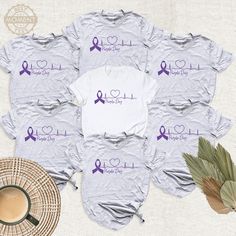 Epilepsy Awareness Shirt, Support Epilepsy Shirt, Epilepsy Warrior Tshirt, Purple Ribbon Shirt, Epilepsy Support Team Tee, Gift For Epilepsy. Welcome to BestMomentTees! Step into a world of comfort and style with our handmade shirts from the renowned Bella Canvas brand. The solid colors are 100% pure cotton, while the delightful heather colors are a charming blend of 52% cotton and 48% polyester. 🍃 Each shirt is a true labor of love, meticulously created using the innovative DTF printing method Purple Casual Top For Awareness Events, Casual Purple Top For Awareness Events, Creative Vibes, Initial Design, Handmade Shirts, Ribbon Shirt, Purple Ribbon, Dtf Printing, Purple Shirt