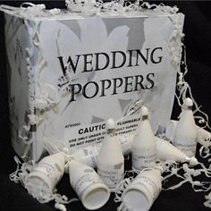 the wedding poppers are all white and have flowers on them