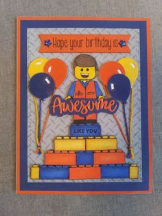 a birthday card with a lego man holding balloons and the words, hope your birthday is awesome like you