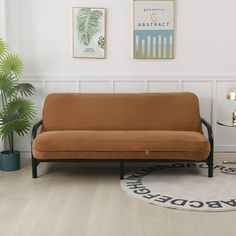 a living room with a couch and rug