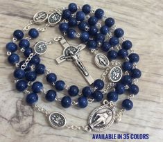 Catholic 5 decade rosary made with 6mm glass beads,silver oxidized miraculous medals on the place of Our father beads,miraculous medal centrepiece and st benedict crucifix. Give a gift of love and prayer with these wonderful rosaries. Hand made in Medjugorje. Feel free to contact me if you have any question. Thank you for stopping by! For more similar items and different colors visit our store: https://www.etsy.com/shop/Thelightjewelry?ref=seller-platform-mcnav Mens Rosary, St Benedict Cross, Blue Rosary, Decade Rosary, Rosary Prayer, Catholic Images, Saint Benedict, St Benedict, Catholic Rosary