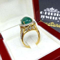 "ENJOY OUR WORRY-FREE SERVICE AND THE DAZZLING, GENUINE JEWELRY WE DESIGN AND HANDCRAFT WITH LOVE❤️ ABOUT THE ITEM: This ring is the perfect combination of elegance, beauty, and INVESTMENT VALUE! With a TRANSPARENT, 6.50 carats, VIVID FOREST GREEN emerald, and 52 extremely sparkling diamonds. The 18K yellow gold ring was deliberately designed and handcrafted by our boutique's in-house goldsmiths. You will love this gorgeous piece as much we do. And people will absolute adore it once they see the Luxury Yellow Gold Cabochon Diamond Ring, Luxury Emerald Cabochon Ring With Diamonds, Fine Jewelry Emerald Diamond Cabochon Ring, Luxury Cabochon Diamond Ring As Gift, Gold Oval Cabochon Diamond Ring For Formal Occasions, Yellow Gold Diamond Cabochons Fine Jewelry, Gold Diamond Ring Oval Cabochon For Formal Occasions, Formal Gold Diamond Ring With Oval Cabochon, Luxury Cabochon Emerald Ring For Wedding