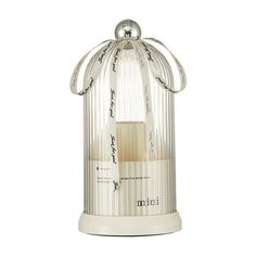 a small white birdcage with an open top on a white background and the words miki written in cursive writing