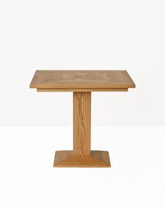 a square wooden table on a white background