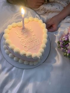 a birthday cake that says you are sweet only with a lit candle on the top