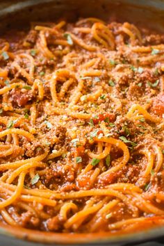 one pot spaghetti in a skillet with the words, one pot spaghetti above it