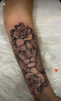 a lion with flowers on his head and foot