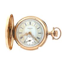 This Elgin pocket watch from 1911 features a beautiful fancy dial with Roman numerals, intricate beading, and gorgeous gold hands. This exquisite 14k gold pocket watch is 0 size and has timelessly elegant engravings on each side of the outer case. B4963 --Please reference our policy for more details-- ALL timepieces are fully serviced and checked for keeping correct time prior to leaving. For International orders, please provide a phone number for shipping purposes. Just place a note in the comm Timeless Formal Pocket Watch With Locket, Elegant Yellow Gold Pocket Watch With Skeleton Dial, Elegant Gold Hallmarked Pocket Watch, Elegant Self-winding Pocket Watch With Round Dial, Gold Self-winding Pocket Watch With Round Dial, Elegant Self-winding Pocket Watch, Yellow Gold Self-winding Pocket Watch, Antique Self-winding Pocket Watch With Round Dial, Collectible Yellow Gold Self-winding Pocket Watch