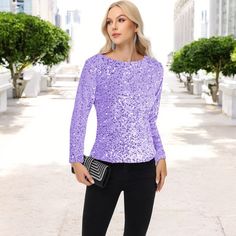 Elevate your style with the Anna-Kaci Women's Sequin Blouse, a perfect blend of elegance and glamour. This long-sleeve top is covered in shimmering sequins, making it ideal for special occasions or a night out. The round neck and comfortable fit ensure ease of wear, while the sparkle detailing adds an eye-catching finish to your outfit. Pair it with jeans for a chic casual look or dress it up with a skirt for a more sophisticated ensemble. Perfect for standing out in any crowd, this top brings a Long Sleeve Sequin Top, Sparkle Blouse, Party Blouse, Sequin Blouse, Long Sleeve Sequin, Elegant Blouses, Chic Casual, Top Round, Polka Dot Blouse