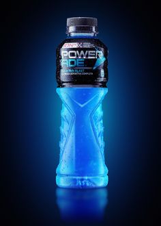 a bottle of powerade on a dark background with blue light coming from the top