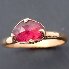 I created this setting in wax then cast it in recycled solid 18k Yellow gold at my home studio. This ring is a size 7 it can be resized up or down. The stone is a tourmaline. it measures about 6mm X 8mm I created a rustic texture in the gold. The band is around 2mm. Throughout all time and history, in every tribe and culture all around the world crystals, minerals and gemstones have used for healing, luck, divination, adornment vibrational medicine and so much more. Red Tourmaline Gemstone Ring, Red Tourmaline Fine Jewelry Rings, Red Tourmaline Rings Fine Jewelry, Fine Jewelry Red Tourmaline Rings, Vibrational Medicine, Rustic Texture, Red Gemstones, 18k Gold Ring, Minerals And Gemstones