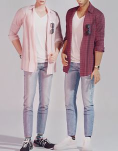 two young men standing next to each other in front of a white background wearing jeans and shirts