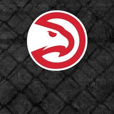 the atlanta hawks logo is shown on a black background with red and white snakeskin