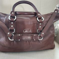 Coach Two Way Satchel Bag, Beautiful Chocolate Brown With Lavender Inside. Two Side Pockets With One Zipper Side Pocket. Handles Are Excellent, Corners Have Some Wear, Inside Has Some Blue Marks And Some Staining On The Bottom. Beautiful Leather Bag, Great Size! Brown Leather Satchel, Beautiful Chocolate, Brown Silver, Satchel Bag, Leather Satchel, Side Pocket, Satchel Bags, Chocolate Brown, Coach Bags