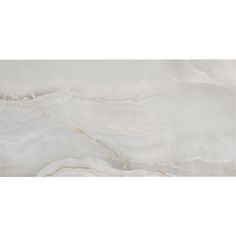 a white marble tile with gold veining