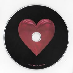 a cd disc with a red heart on it