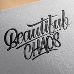 the words beautiful chaos written in black ink