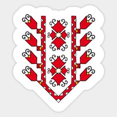 a heart shaped sticker with red and white designs on the front, in an ornate pattern