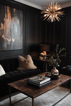 a living room filled with furniture and a chandelier above the coffee table on top of a rug