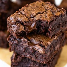 chocolate brownies stacked on top of each other