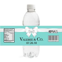 a water bottle label with a bow on it