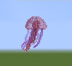 a pixellated image of a jellyfish in the air with blue sky behind it