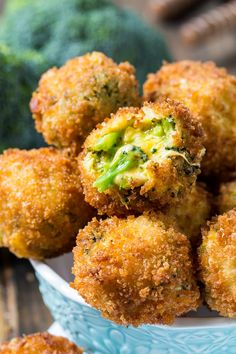 broccoli and cheese balls in a bowl on a table