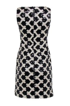 This show-stopping Lauren Ralph Lauren dress demands attention with sparkle and dazzle. From the shimmering sequins, to the black & beige interlocking pattern, this show-stopping sheath silhouette will have you looking like a million bucks. Step up your game with black heels and get ready to make heads turn! Size 2 Shell 100% Polyester Lining 95% Polyester, 5% Elastane Concealed back zipper Interlocking sequin pattern Sleeveless Boat neckline Sheath silhouette Bust 32.5" Waist 29" Shoulder to he Chic Ralph Lauren Party Dress, Chic Black Ralph Lauren Dress, Chloe 2024, Interlocking Pattern, Sequin Pattern, Ralph Lauren Dress, Boat Neckline, Black Heels, Lauren Ralph Lauren