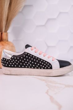 The classic black sneakers are elevated with edgy metal studs and a shiny silver star accent. Bring some sparkle to your step and show off your quirky style with every strut. Fit: True to Size. If you are a 1/2 size or have a wide foot, size up. Brand: Corky's Casual Lace-up Sneakers With Rivets, Casual Leather Sneakers With Studs, Casual Studded Lace-up Sneakers, Casual Leather Sneakers With Rivets, Studded Low-top Sneakers For Streetwear, Trendy Low-top Spiked Sneakers, Low-top Studded Sneakers For Streetwear, Punk Low-top Sneakers With Spikes, Edgy Lace-up Sneakers With Studded Rubber Outsoles