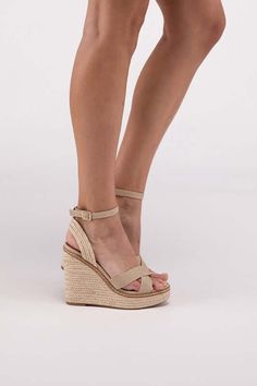 Elevate your summer wardrobe with our BASSET-S Espadrilles. These platform wedge sandals combine style and comfort, featuring a chic criss-cross strap design for added elegance and an ankle strap for extra support. The espadrille platform adds height while keeping you comfortable all day long. Style: Casual Silhouette: Wedge Sandal Embellishment: Criss Cross Length: Ankle Closure: Buckle Heel Height: 5" Width: Regular Material Composition: Suede sole. Material: Synthetic Imported Ankle Compression Socks, Farm Clothes, Espadrilles Platform, Buckled Heels, Ankle Support, Waist Bags, Platform Wedge Sandals, Silver Shoes, Green Shoes