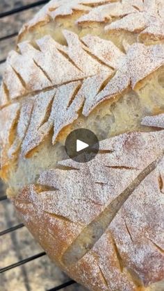 a loaf of bread sitting on top of a cooling rack